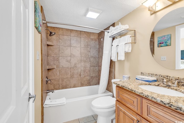 full bathroom featuring a textured ceiling, tile patterned flooring, vanity, toilet, and shower / tub combo with curtain