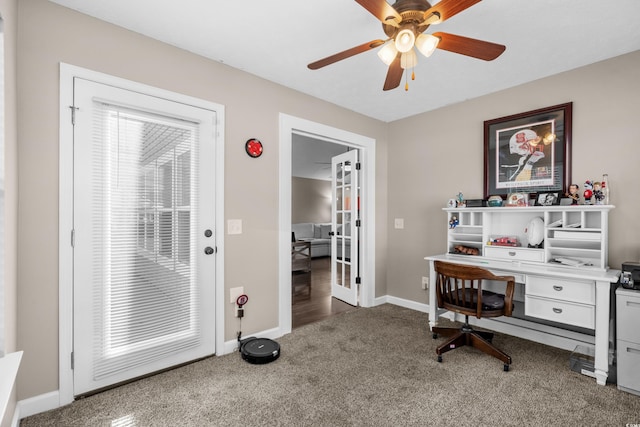 carpeted office featuring ceiling fan and french doors