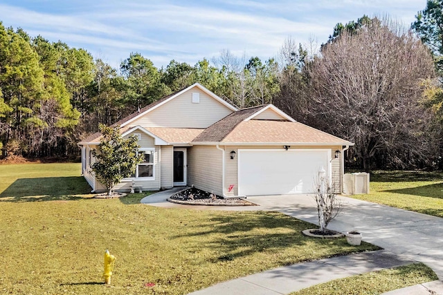 view of front facade featuring a garage and a front yard