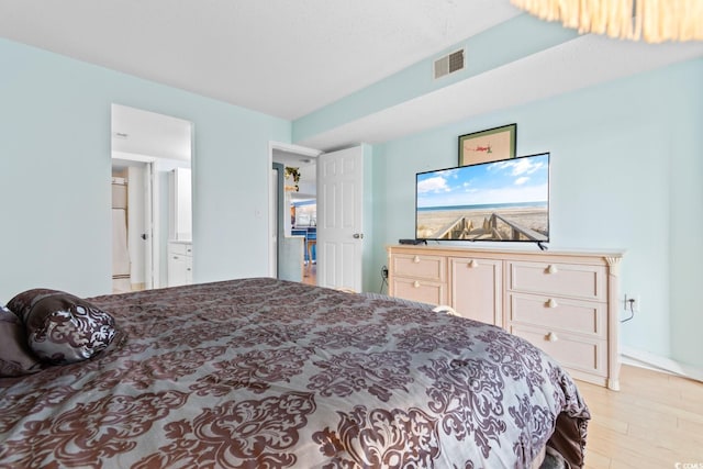 bedroom with light hardwood / wood-style floors