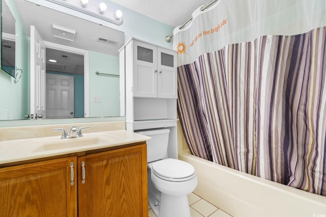 full bathroom with toilet, vanity, tile patterned floors, shower / tub combo, and a textured ceiling