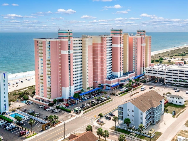 drone / aerial view with a view of the beach and a water view