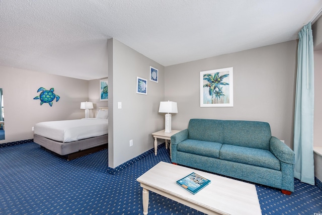 carpeted bedroom with a textured ceiling