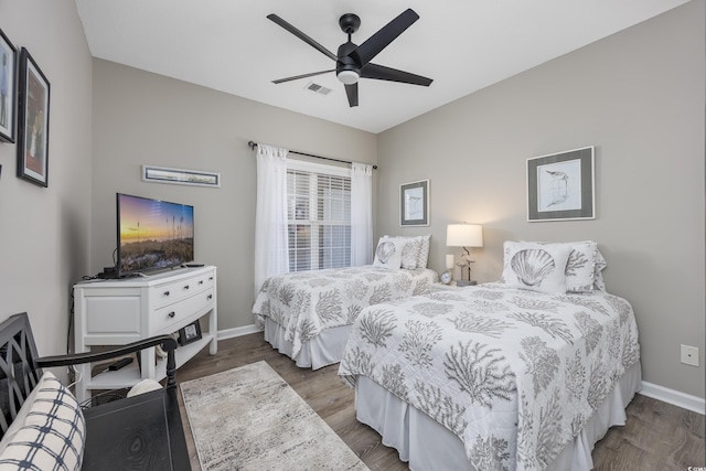 4210 Coquina Harbour Dr Unit A-16, Little River, SC 29566 - bedroom with wood finished floors and a ceiling fan