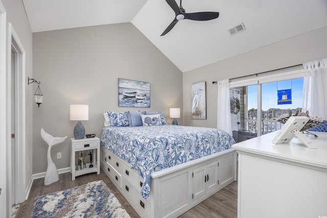 4210 Coquina Harbour Dr Unit A-16, Little River, SC 29566 - bedroom with access to exterior, wood finished floors, a ceiling fan, and high vaulted ceiling