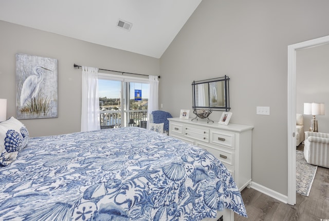 4210 Coquina Harbour Dr Unit A-16, Little River, SC 29566 - bedroom with access to outside, wood finished floors, and high vaulted ceiling