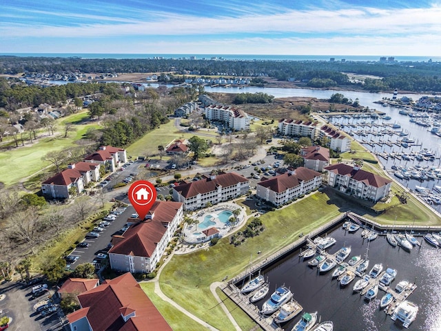 4210 Coquina Harbour Dr Unit A-16, Little River, SC 29566 - drone / aerial view of a marina and a nearby body of water