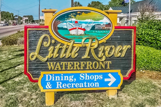 4210 Coquina Harbour Dr Unit A-16, Little River, SC 29566 - view of community / neighborhood sign