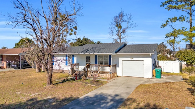 789 University Forest Cir, Conway, SC 29526 - ranch-style house featuring an attached garage, a porch, concrete driveway, and roof with shingles