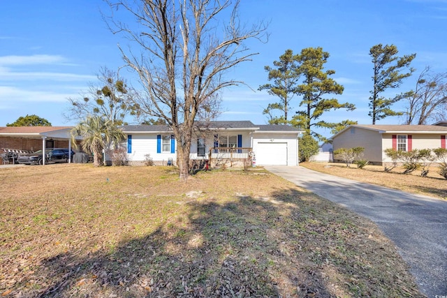 ranch-style home with covered porch, a front yard, and a garage