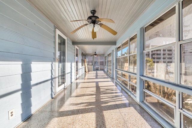 unfurnished sunroom with wooden ceiling