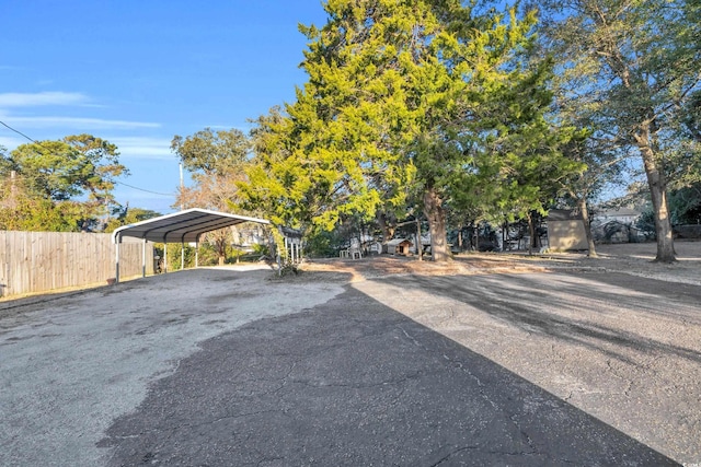 view of yard featuring a carport