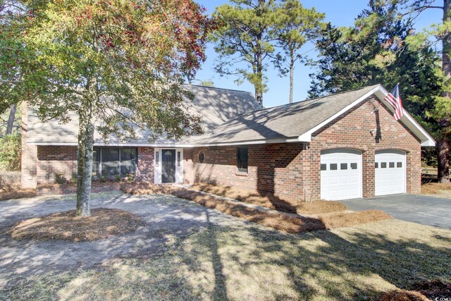 view of front of property featuring a garage