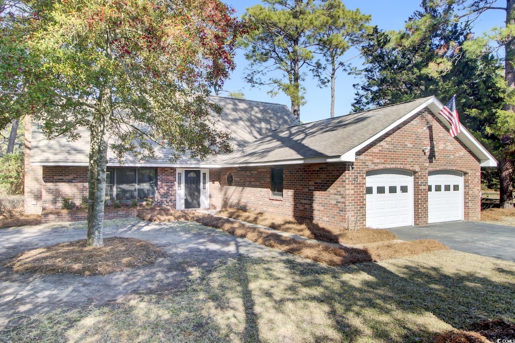 ranch-style house with a garage