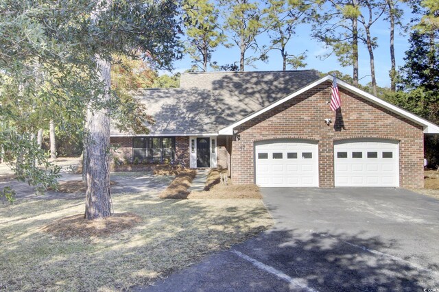 ranch-style house with a garage