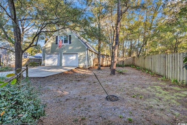 view of yard featuring a garage