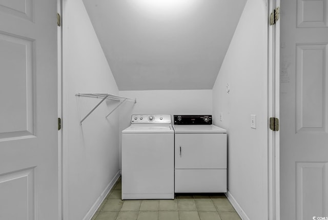 clothes washing area featuring independent washer and dryer