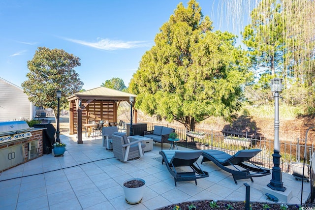 view of patio / terrace featuring a gazebo, an outdoor living space, and area for grilling