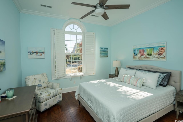 bedroom featuring ceiling fan, dark wood-type flooring, and crown molding