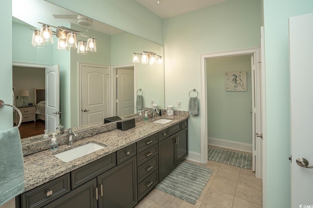 bathroom featuring vanity and tile patterned flooring