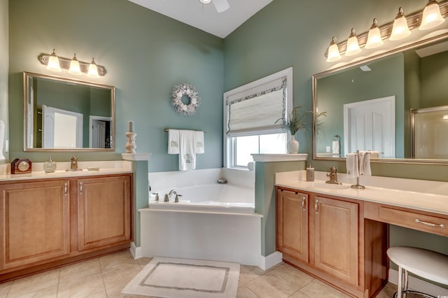 bathroom featuring ceiling fan, independent shower and bath, tile patterned floors, and vanity