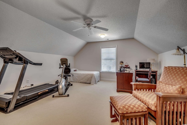 bedroom with a textured ceiling, ceiling fan, lofted ceiling, and carpet floors