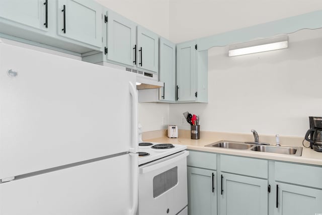 kitchen featuring sink and white appliances