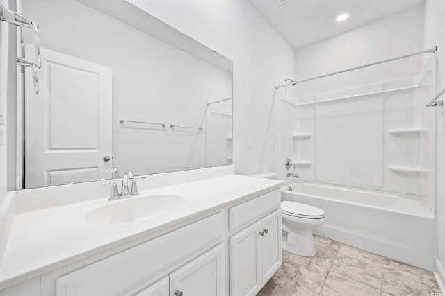 full bathroom featuring toilet, vanity, and shower / washtub combination