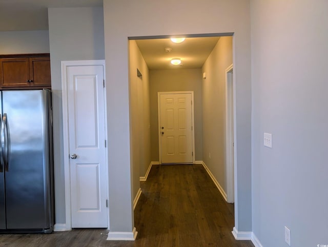 hall featuring dark wood-type flooring