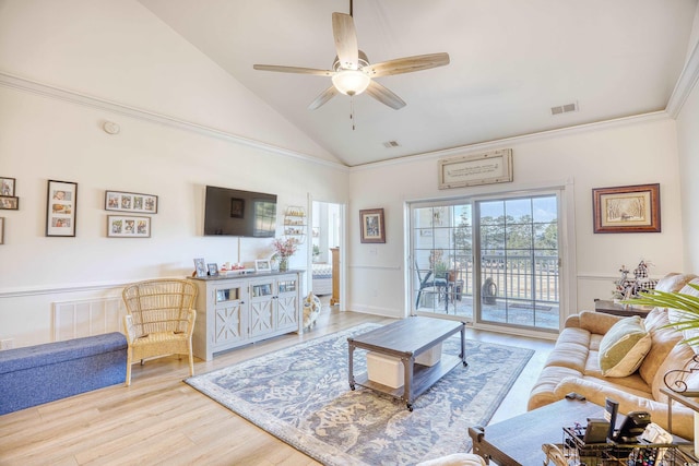 living room featuring ceiling fan, light hardwood / wood-style flooring, and high vaulted ceiling