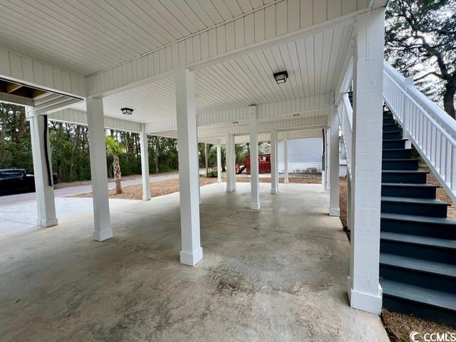 view of patio / terrace featuring stairs