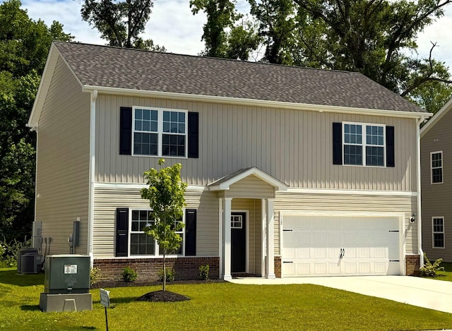 112 Lakota Loop, Longs, SC 29568 - view of front of home featuring a garage, driveway, a front yard, central AC unit, and brick siding