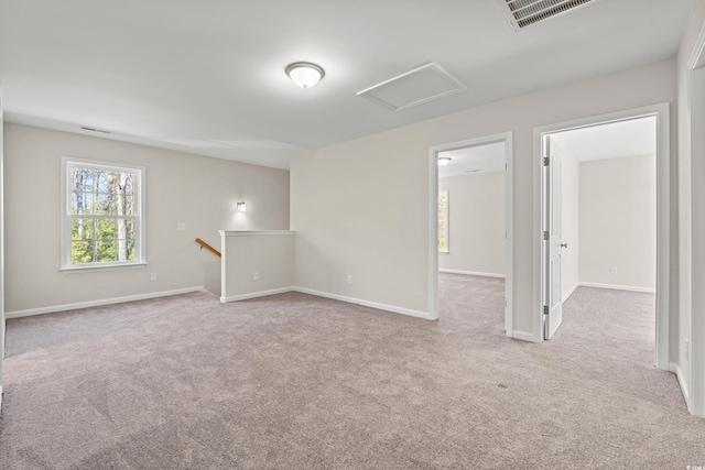 112 Lakota Loop, Longs, SC 29568 - carpeted spare room featuring attic access and baseboards