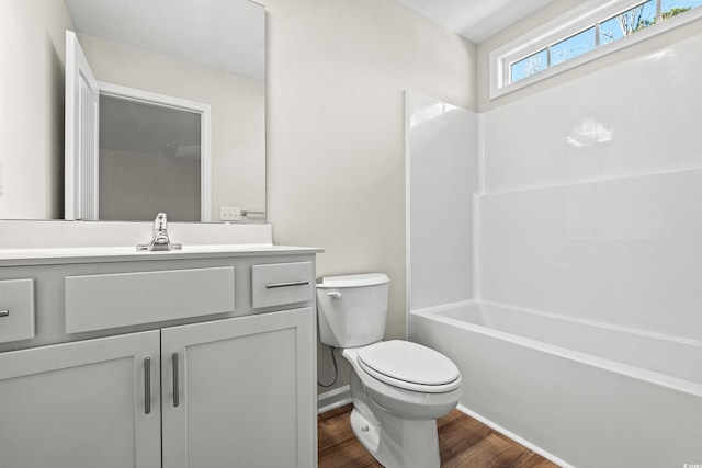 112 Lakota Loop, Longs, SC 29568 - bathroom with wood finished floors, toilet, vanity, bathing tub / shower combination, and baseboards