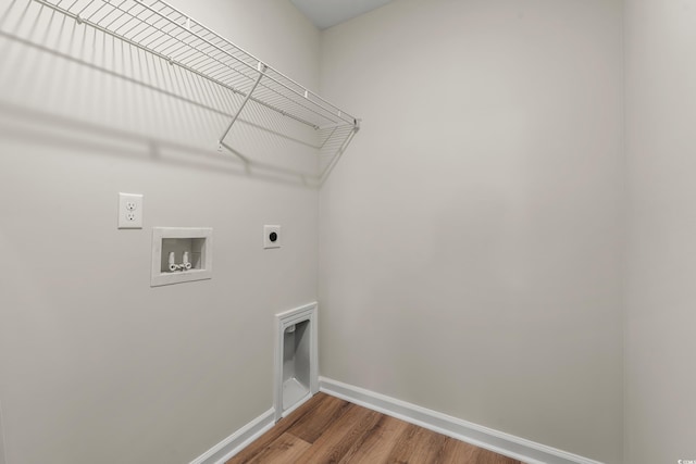 112 Lakota Loop, Longs, SC 29568 - laundry room featuring hookup for an electric dryer, washer hookup, wood finished floors, and baseboards