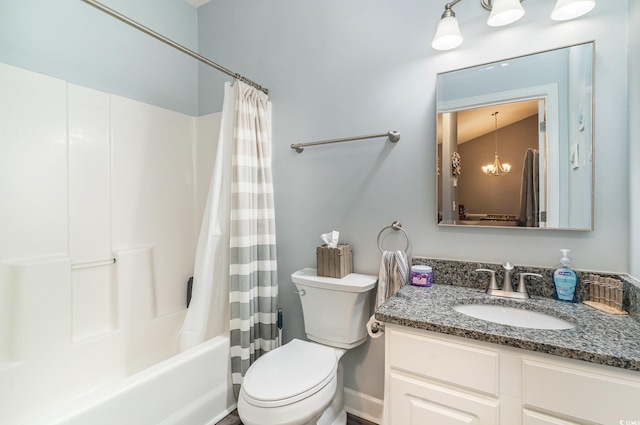 full bathroom with toilet, a chandelier, shower / tub combo, and vanity