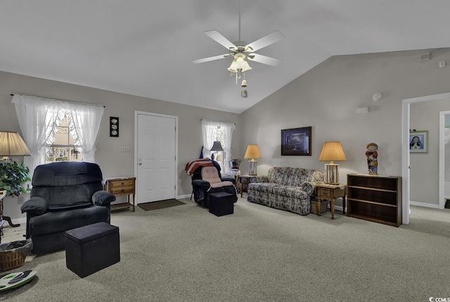 carpeted living room featuring ceiling fan and high vaulted ceiling