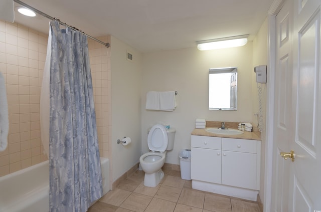 full bathroom with vanity, tile patterned floors, toilet, and shower / bath combo with shower curtain