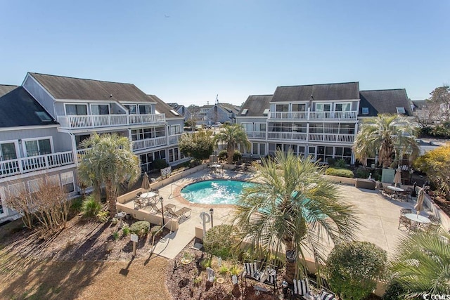 view of swimming pool featuring a patio area