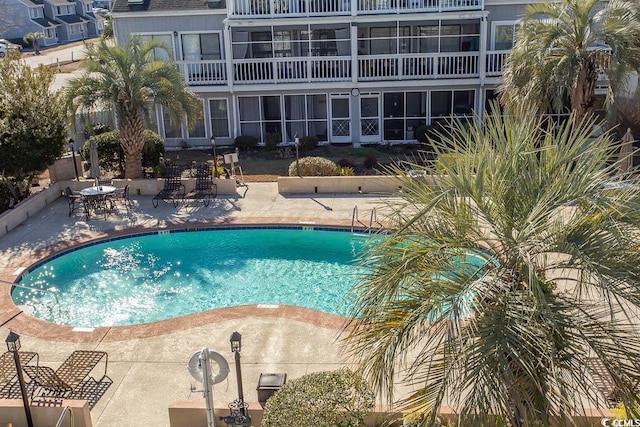 view of pool with a patio area