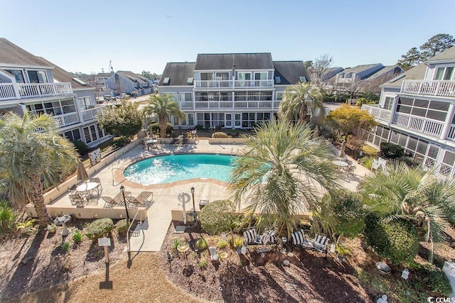 view of swimming pool with a patio