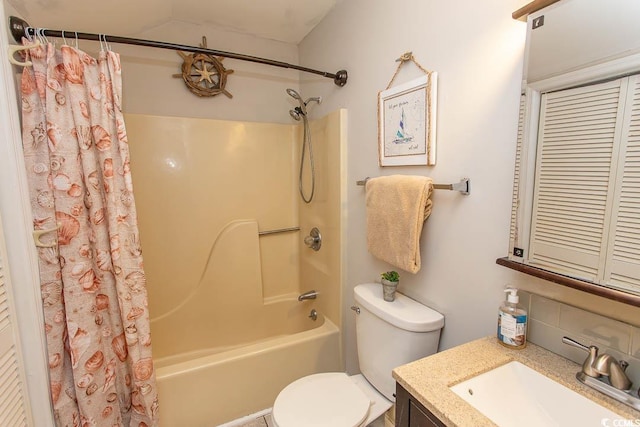 full bathroom featuring vanity, shower / bath combination with curtain, and toilet