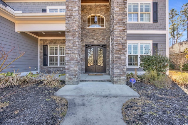 property entrance featuring french doors