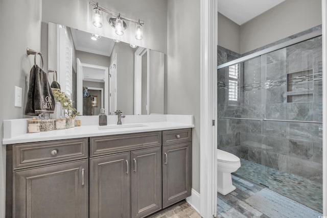 bathroom with vanity, wood-type flooring, an enclosed shower, and toilet