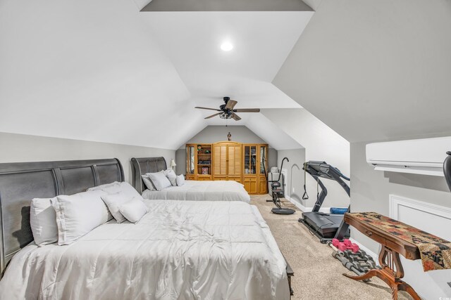 bedroom featuring lofted ceiling, carpet flooring, a wall mounted AC, and ceiling fan