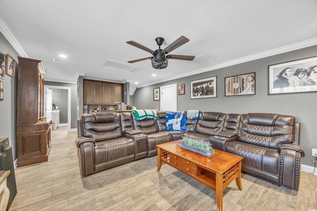 living room with ornamental molding, ceiling fan, and light hardwood / wood-style floors