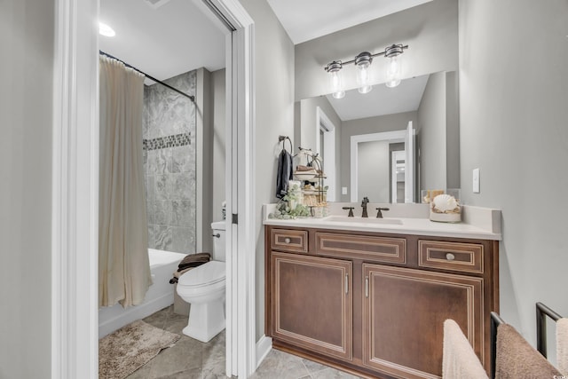 full bathroom featuring vanity, shower / tub combo with curtain, and toilet