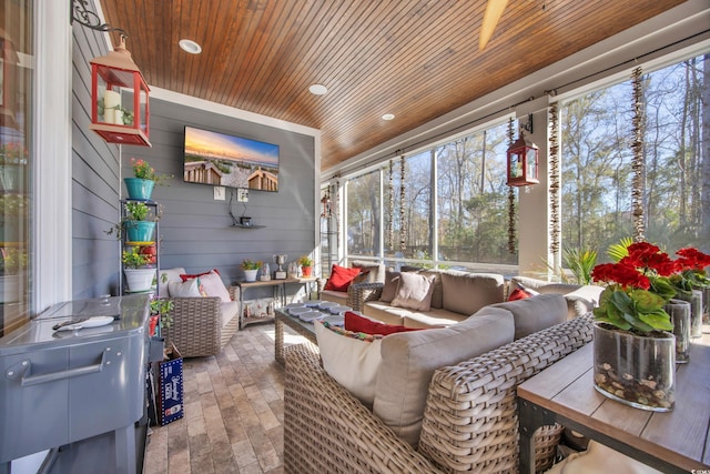 sunroom / solarium with wooden ceiling