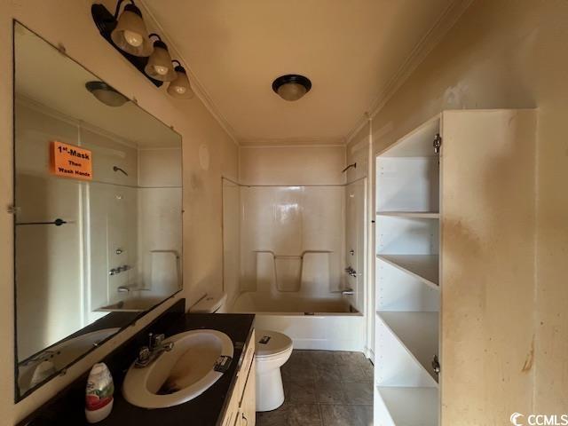 full bathroom featuring toilet, crown molding, tub / shower combination, and vanity