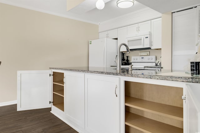 kitchen featuring white appliances, dark wood-type flooring, stone countertops, crown molding, and white cabinets